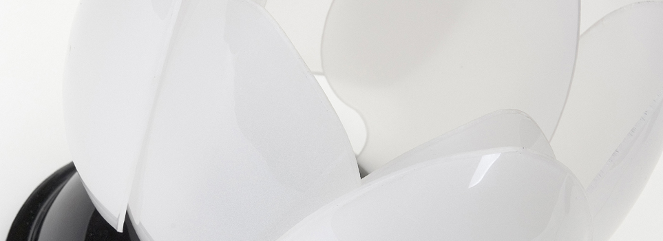 Flower inspired, variable-brightness lamp.